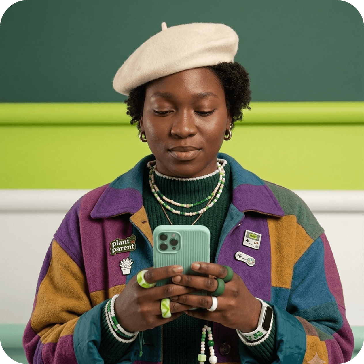 Person looking at a green smartphone