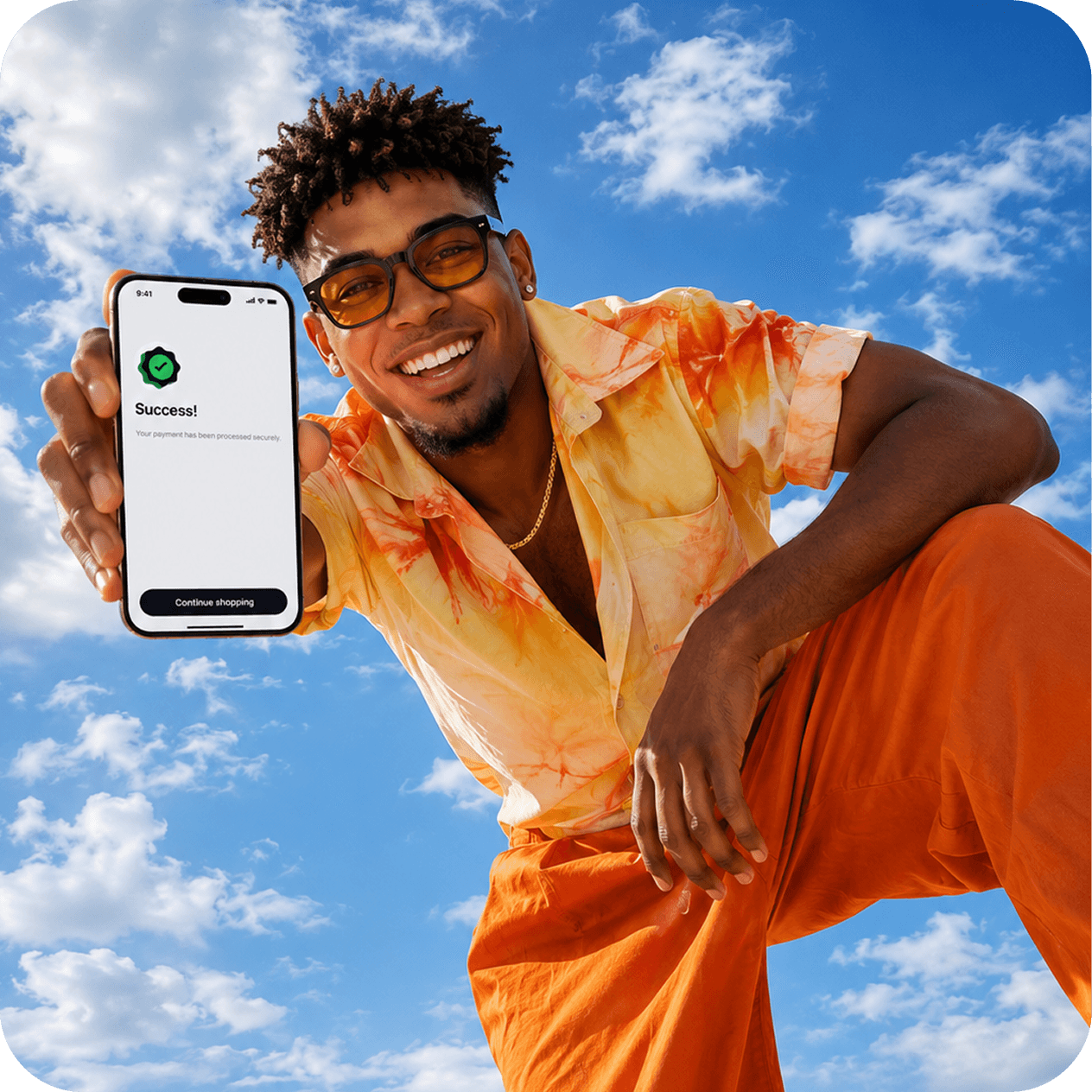 Person holding up a smartphone outdoors